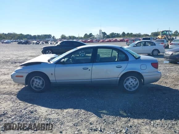 2002 Saturn SL с VIN 1G8ZK52702Z243549, выставлен на аукционе IAAI как лот 43488210 с пробегом 155 263 миль миль и . История ставок и продаж доступна на DreamBid. Изображение 14.