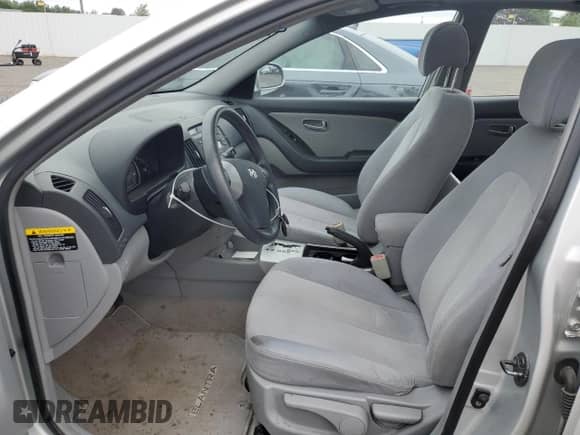 2007 Hyundai Elantra GLS with VIN KMHDU46DX7U084981, listed as a Copart auction lot 61230984 with 93,887 mi miles and Salvage title. Bid and sale history available at DreamBid. Image 7.