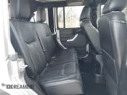 ✅ 2018 Jeep Wrangler Unlimited Rubicon Recon • VIN: 1C4HJWFG9JL840446 • Lot: 41804678. Listed on IAAI with 133,633 mi. Free auction sales archive from the USA and detailed vehicle history report at DreamBid. Image 8.