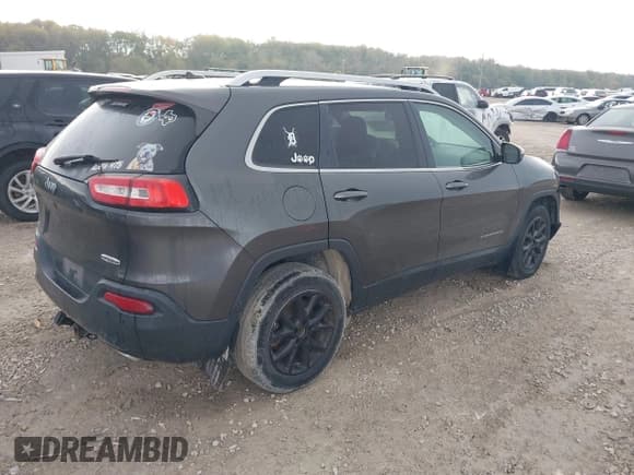 ✅ 2015 Jeep Cherokee Latitude • VIN: 1C4PJLCS9FW770679 • Lot: 43588711. Wystawiony na IAAI z przebiegiem 144 642 mil. Bezpłatny archiwum sprzedaży aukcyjnych z USA i szczegółowy raport historii pojazdu na DreamBid. Zdjęcie 4.