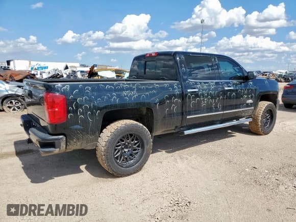 ✅ 2018 Chevrolet Silverado 1500 High Country • VIN: 3GCUKTEC7JG215906 • Лот: 63675725. Опубликован ранее на Copart с пробегом 104 345 миль. Бесплатный доступ к архиву аукционных продаж из США и подробный отчёт об истории автомобиля на DreamBid. Изображение 3.