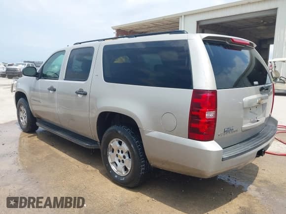 ✅ 2009 Chevrolet Suburban LS • VIN: 1GNFC16029R201204 • Lot: 42855407. Listed on IAAI with 220,289 mi. Free auction sales archive from the USA and detailed vehicle history report at DreamBid. Image 3.