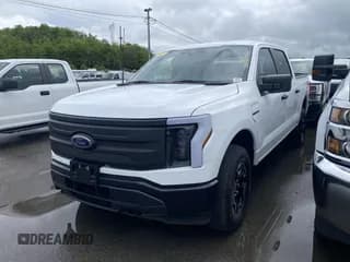 ✅ 2022 Ford F-150 Lightning Pro • VIN: 1FTVW1ELXNWG14877 • Лот: 42307128. Опубликован ранее на IAAI с пробегом 10 264 миль. Бесплатный доступ к архиву аукционных продаж из США и подробный отчёт об истории автомобиля на DreamBid. Изображение 1.