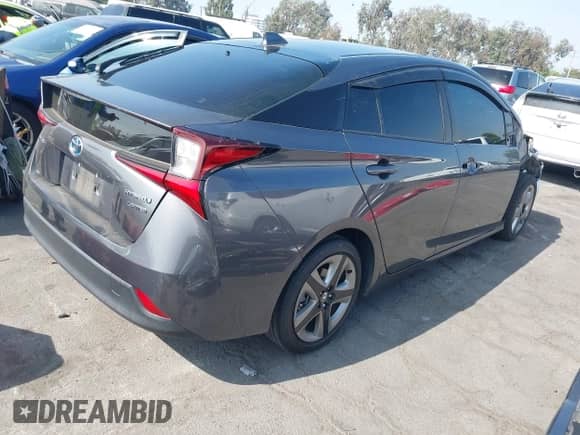 2022 Toyota Prius L Eco z VIN JTDKAMFU8N3173343, wystawiony jako IAAI lot #43008600 z przebiegiem 46 161 mil mil oraz . Historia ofert i sprzedaży dostępna na DreamBid. Obrazek 4.