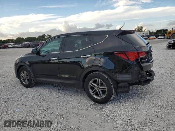 ✅ 2018 Hyundai Santa Fe 2.4L • VIN: 5NMZT3LB2JH066256 • Lot: 87420995. Listed on Copart with 127,034 mi. Free auction sales archive from the USA and detailed vehicle history report at DreamBid. Image 2.