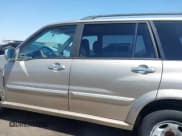 ✅ 2003 Suzuki XL7 Touring • VIN: JS3TX92V534103046 • Lot: 41978971. Listed on IAAI with 185,038 mi. Free auction sales archive from the USA and detailed vehicle history report at DreamBid. Image 14.