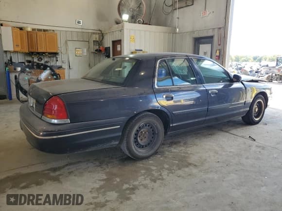 ✅ 1999 Ford Crown Victoria Police • VIN: 2FAFP71WXXX192272 • Лот: 73577384. Опубликован ранее на Copart с пробегом 278 535 миль. Бесплатный доступ к архиву аукционных продаж из США и подробный отчёт об истории автомобиля на DreamBid. Изображение 3.