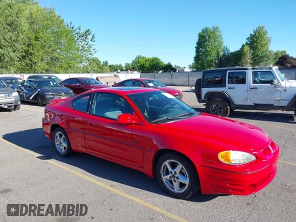 ✅ 2001 Pontiac Grand Am GT1 • VIN: 1G2NV12E61M541932 • Лот: 42701634. Опубликован ранее на IAAI с пробегом 77 435 миль. Бесплатный доступ к архиву аукционных продаж из США и подробный отчёт об истории автомобиля на DreamBid. Изображение 1.