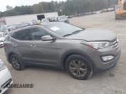 ✅ 2014 Hyundai Santa Fe • VIN: 5XYZUDLB0EG150479 • Lot: 43361152. Listed on IAAI with 163,969 mi. Free auction sales archive from the USA and detailed vehicle history report at DreamBid. Image 13.