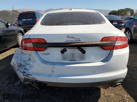 ✅ 2014 Jaguar XF T • VIN: SAJWA0ES3EPU24208 • Лот: 74617464. Опубликован ранее на Copart с пробегом 128 874 миль. Бесплатный доступ к архиву аукционных продаж из США и подробный отчёт об истории автомобиля на DreamBid. Изображение 6.