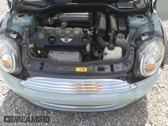 ✅ 2012 MINI Convertible • VIN: WMWZN3C5XCT134595 • Lot: 52752455. Wystawiony na Copart z przebiegiem 145 915 mil. Bezpłatny archiwum sprzedaży aukcyjnych z USA i szczegółowy raport historii pojazdu na DreamBid. Zdjęcie 11.