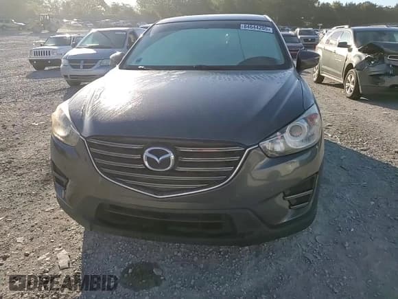✅ 2016 Mazda CX-5 Sport • VIN: JM3KE4BY5G0799523 • Lot: 84644205. Listed on Copart with 149,112 mi. Free auction sales archive from the USA and detailed vehicle history report at DreamBid. Image 14.