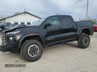 ✅ 2023 GMC Canyon 4WD AT4X • VIN: 1GTP6EEK4P1228687 • Лот: 52723815. Опубликован ранее на Copart с пробегом 20 168 миль. Бесплатный доступ к архиву аукционных продаж из США и подробный отчёт об истории автомобиля на DreamBid. Изображение 1.