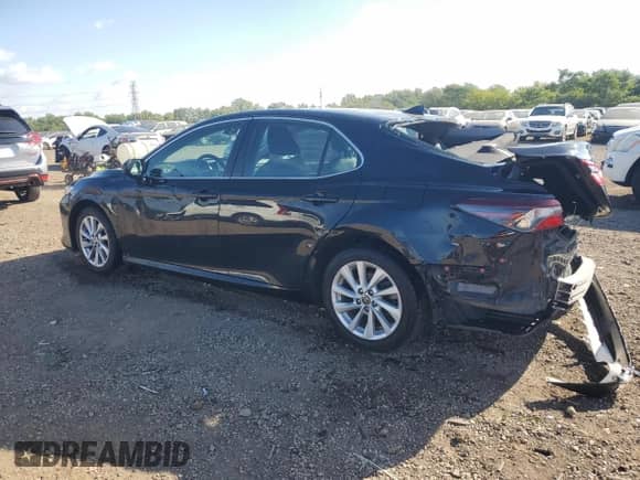 2023 Toyota Camry LE z VIN 4T1C11AK0PU725483, wystawiony jako Copart lot #71720255 z przebiegiem 76 231 mil mil oraz Szkoda całkowita • Salvage title. Historia ofert i sprzedaży dostępna na DreamBid. Obrazek 2.