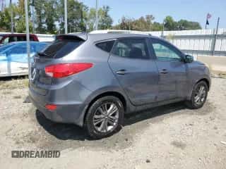 2014 Hyundai Tucson SE z VIN KM8JU3AG0EU791745, wystawiony jako Copart lot #69204404 z przebiegiem 169 765 mil mil oraz Szkoda całkowita • Salvage title. Historia ofert i sprzedaży dostępna na DreamBid. Obrazek 3.