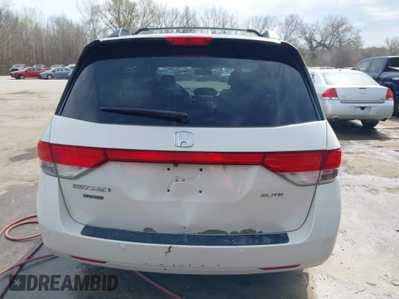 ✅ 2014 Honda Odyssey Touring • VIN: 5FNRL5H94EB057681 • Lot: 41828000. Listed on IAAI with 249,350 mi. Free auction sales archive from the USA and detailed vehicle history report at DreamBid. Image 17.