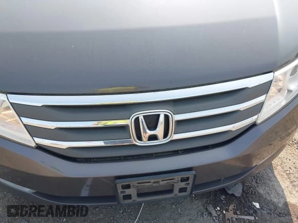 ✅ 2012 Honda Odyssey Touring • VIN: 5FNRL5H92CB059118 • Lot: 42415626. Listed on IAAI with 171,513 mi. Free auction sales archive from the USA and detailed vehicle history report at DreamBid. Image 6.