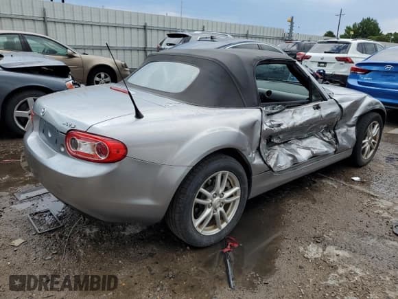 ✅ 2010 Mazda MX-5 Miata Touring • VIN: JM1NC2EF0A0209035 • Lot: 63233614. Wystawiony na Copart z przebiegiem 62 702 mil. Bezpłatny archiwum sprzedaży aukcyjnych z USA i szczegółowy raport historii pojazdu na DreamBid. Zdjęcie 3.