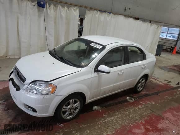 2011 Chevrolet Aveo 1LT с VIN KL1TD5DE3BB212393, выставлен на аукционе Copart как лот 84867314 с пробегом 96 342 миль миль и Списание • Salvage title. История ставок и продаж доступна на DreamBid. Изображение 1.