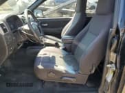 ✅ 2012 Chevrolet Colorado 1LT • VIN: 1GCESCFE3C8122071 • Лот: 63241735. Опубликован ранее на Copart с пробегом 229 958 миль. Бесплатный доступ к архиву аукционных продаж из США и подробный отчёт об истории автомобиля на DreamBid. Изображение 7.