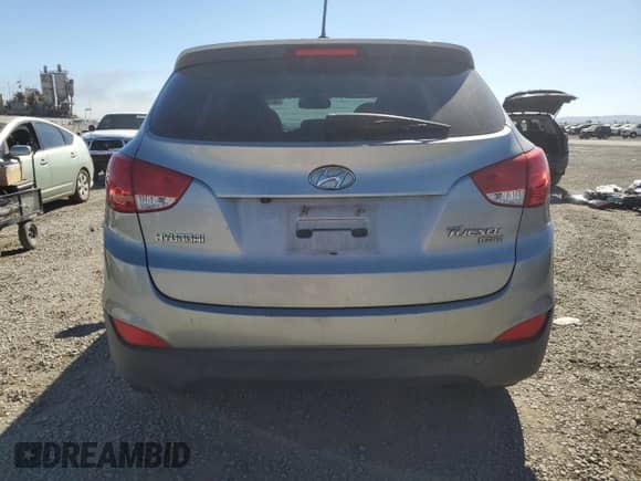 2012 Hyundai Tucson GLS with VIN KM8JU3AC2CU497998, listed as a Copart auction lot 90383415 with 239,792 mi miles and Clean title. Bid and sale history available at DreamBid. Image 6.