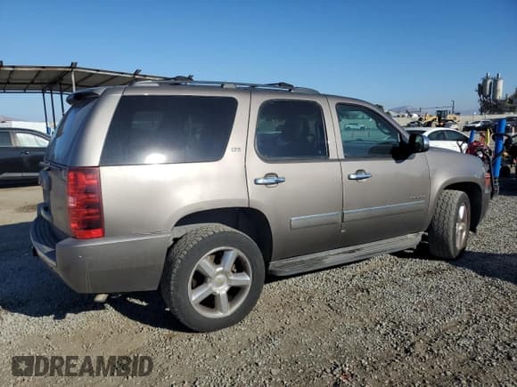 ✅ 2013 Chevrolet Tahoe LTZ • VIN: 1GNSCCE01DR365631 • Lot: 80849565. Listed on Copart with 260,352 mi. Free auction sales archive from the USA and detailed vehicle history report at DreamBid. Image 3.