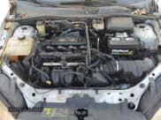 ✅ 2005 Ford Focus S • VIN: 1FAFP34N05W169006 • Lot: 92454825. Listed on Copart with Not provided. Free auction sales archive from the USA and detailed vehicle history report at DreamBid. Image 11.