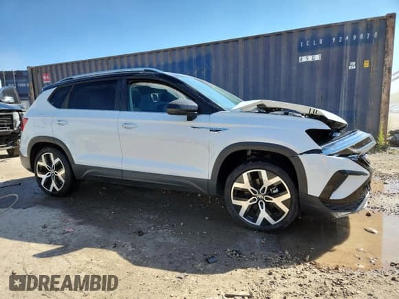 ✅ 2023 Volkswagen Taos SEL • VIN: 3VV2X7B21PM340293 • Lot: 71027865. Listed on Copart with 29,991 mi. Free auction sales archive from the USA and detailed vehicle history report at DreamBid. Image 4.