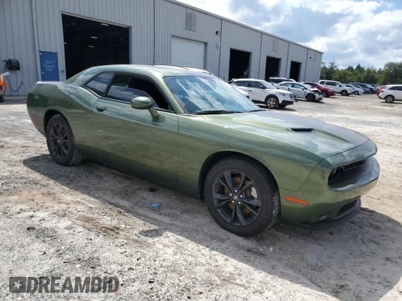 ✅ 2023 Dodge Challenger SXT • VIN: 2C3CDZGG0PH565870 • Lot: 71253634. Wystawiony na Copart z przebiegiem 11 094 mil. Bezpłatny archiwum sprzedaży aukcyjnych z USA i szczegółowy raport historii pojazdu na DreamBid. Zdjęcie 4.