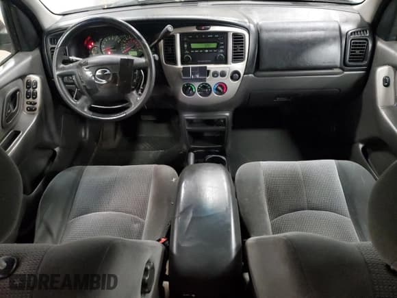 ✅ 2003 Mazda Tribute LX • VIN: 4F2YZ04173KM05549 • Lot: 86702895. Listed on Copart with 128,757 mi. Free auction sales archive from the USA and detailed vehicle history report at DreamBid. Image 8.