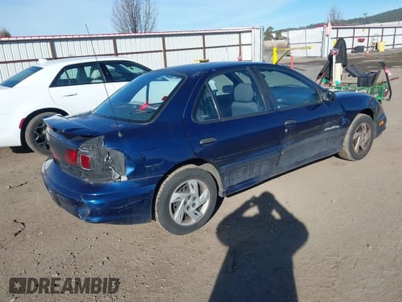 ✅ 2001 Pontiac Sunfire SE • VIN: 1G2JB524917238308 • Lot: 41648082. Wystawiony na IAAI z przebiegiem 262 445 mil. Bezpłatny archiwum sprzedaży aukcyjnych z USA i szczegółowy raport historii pojazdu na DreamBid. Zdjęcie 4.