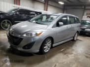 ✅ 2012 Mazda 5 Grand Touring • VIN: JM1CW2DL5C0143414 • Lot: 92329075. Listed on Copart with 107,084 mi. Free auction sales archive from the USA and detailed vehicle history report at DreamBid. Image 1.