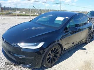 ✅ 2023 Tesla Model X • VIN: 7SAXCDE51PF370132 • Lot: 43533532. Listed on IAAI with 30,329 mi. Free auction sales archive from the USA and detailed vehicle history report at DreamBid. Image 2.