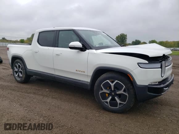 ✅ 2022 Rivian R1T Adventure • VIN: 7FCTGAAA8NN012505 • Lot: 72496734. Wystawiony na Copart z przebiegiem 5 916 mil. Bezpłatny archiwum sprzedaży aukcyjnych z USA i szczegółowy raport historii pojazdu na DreamBid. Zdjęcie 4.