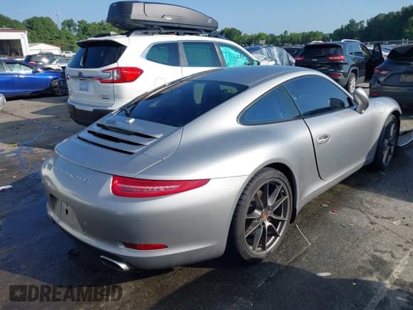✅ 2014 Porsche 911 Carrera • VIN: WP0AA2A9XES107658 • Lot: 42941311. Listed on IAAI with 23,822 mi. Free auction sales archive from the USA and detailed vehicle history report at DreamBid. Image 4.