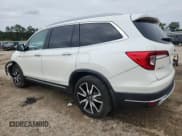 ✅ 2019 Honda Pilot Touring 8-Passenger • VIN: 5FNYF5H91KB018111 • Lot: 71864465. Listed on Copart with 96,937 mi. Free auction sales archive from the USA and detailed vehicle history report at DreamBid. Image 2.