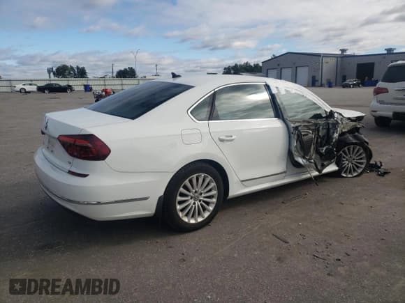 ✅ 2017 Volkswagen Passat SE • VIN: 1VWBT7A36HC013909 • Lot: 82458255. Listed on Copart with 126,475 mi. Free auction sales archive from the USA and detailed vehicle history report at DreamBid. Image 3.