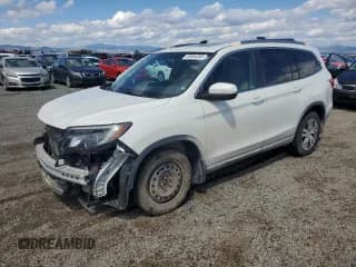 ✅ 2017 Honda Pilot EX-L • VIN: 5FNYF5H52HB045517 • Lot: 65354305. Listed on Copart with 64,024 mi. Free auction sales archive from the USA and detailed vehicle history report at DreamBid. Image 1.