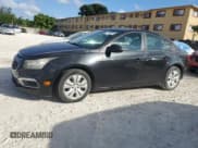 ✅ 2015 Chevrolet Cruze LS • VIN: 1G1PA5SH7F7178444 • Lot: 90308745. Listed on Copart with 74,681 mi. Free auction sales archive from the USA and detailed vehicle history report at DreamBid. Image 1.