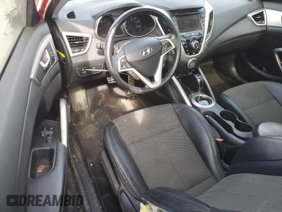 ✅ 2014 Hyundai Veloster • VIN: KMHTC6AD4EU211609 • Lot: 45194775. Wystawiony na Copart z przebiegiem 67 081 mil. Bezpłatny archiwum sprzedaży aukcyjnych z USA i szczegółowy raport historii pojazdu na DreamBid. Zdjęcie 8.