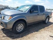 ✅ 2021 Nissan Frontier SV • VIN: 1N6ED0EA0MN710260 • Lot: 42292937. Listed on IAAI with 63,573 mi. Free auction sales archive from the USA and detailed vehicle history report at DreamBid. Image 2.