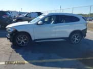 ✅ 2018 BMW X1 xDrive28i • VIN: WBXHT3C38J3H30018 • Lot: 43694942. Listed on IAAI with 50,899 mi. Free auction sales archive from the USA and detailed vehicle history report at DreamBid. Image 14.