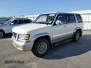 ✅ 1998 Isuzu Trooper S • VIN: JACDJ58X4W7915462 • Lot: 45632975. Listed on Copart with 135,215 mi. Free auction sales archive from the USA and detailed vehicle history report at DreamBid. Image 1.