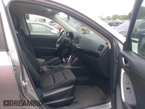 ✅ 2014 Mazda CX-5 Touring • VIN: JM3KE2CY4E0375153 • Lot: 43000591. Wystawiony na IAAI z przebiegiem 74 198 mil. Bezpłatny archiwum sprzedaży aukcyjnych z USA i szczegółowy raport historii pojazdu na DreamBid. Zdjęcie 5.