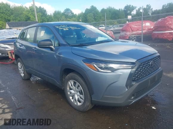 ✅ 2024 Toyota Corolla Cross L • VIN: 7MUAAABG4RV084390 • Lot: 42282541. Listed on IAAI with 31,799 mi. Free auction sales archive from the USA and detailed vehicle history report at DreamBid. Image 1.