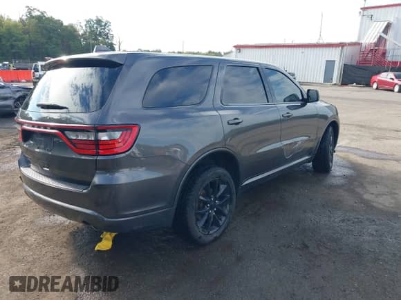 2018 Dodge Durango SXT with VIN 1C4RDJAGXJC291300, listed as a IAAI auction lot 43309283 with 92,879 mi miles and . Bid and sale history available at DreamBid. Image 4.