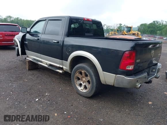 ✅ 2009 Dodge 1500 Laramie • VIN: 1D3HV13T69S799484 • Lot: 42312702. Wystawiony na IAAI z przebiegiem 254 233 mil. Bezpłatny archiwum sprzedaży aukcyjnych z USA i szczegółowy raport historii pojazdu na DreamBid. Zdjęcie 3.