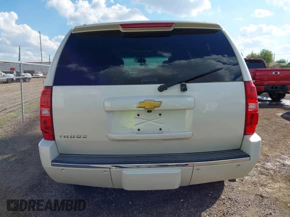 2013 Chevrolet Tahoe LTZ with VIN 1GNSCCE09DR357731, listed as a IAAI auction lot 43343449 with 148,667 mi miles and . Bid and sale history available at DreamBid. Image 17.