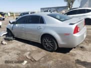 ✅ 2011 Chevrolet Malibu 1LS • VIN: 1G1ZB5E12BF234455 • Lot: 66044454. Listed on Copart with 161,759 mi. Free auction sales archive from the USA and detailed vehicle history report at DreamBid. Image 2.