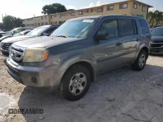 ✅ 2009 Honda Pilot LX • VIN: 5FNYF38269B026562 • Lot: 70111275. Listed on Copart with 166,413 mi. Free auction sales archive from the USA and detailed vehicle history report at DreamBid. Image 1.